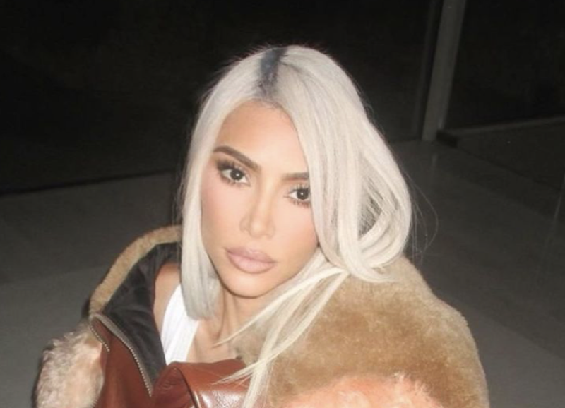 Kim Kardashian Fans Slam Her For Posing With A Mountain Of Designer Bags
