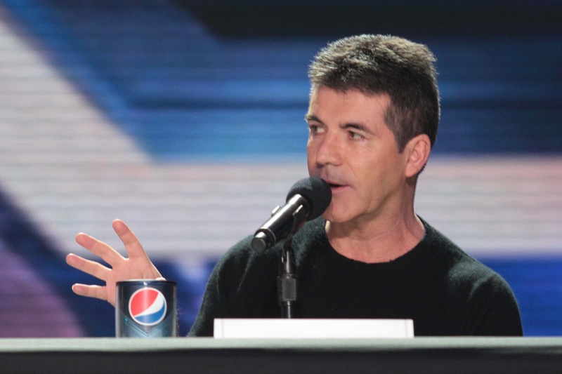 Crippled Simon Cowell Is Wearing A Corset To Ease His Back Pain