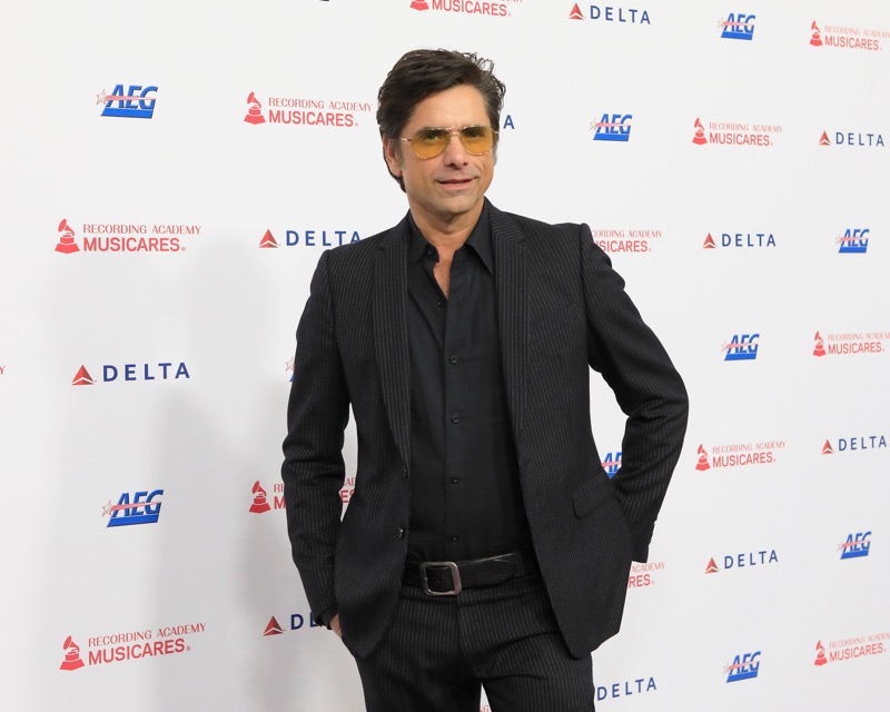 John Stamos On Ryan Gosling Making Him Embrace the Joy of Being A Disney Adult: “The Whole World Goes Away”