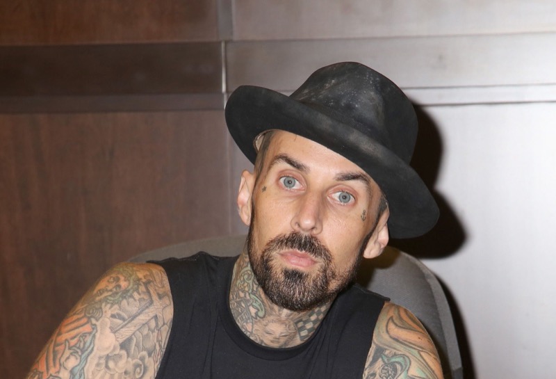 Travis Barker Denies Being the Cause of Feud Between Kim Kardashian and Wife Kourtney