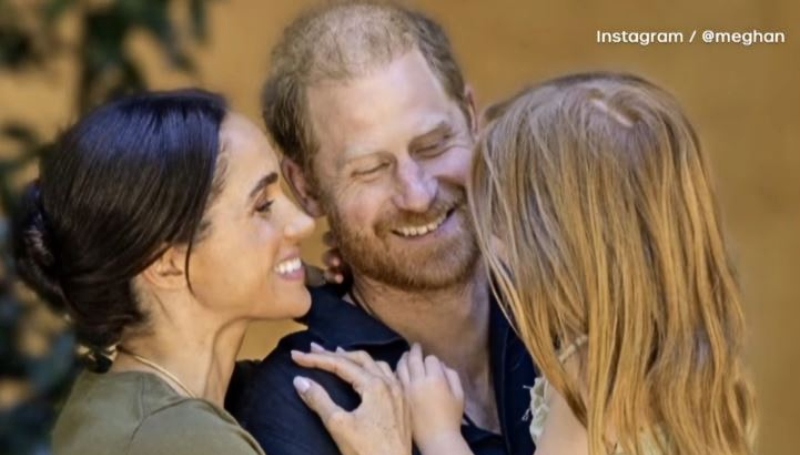 Prince Harry and Meghan Markle with one of the kids - @meghan - Instagram